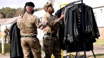 Soldiers bring kit to their accommodation at Pirbright to prepare of Operation Forth Bridge (Picture: MOD).