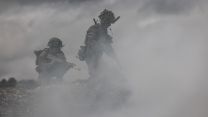 Soldiers use smoke to cover movement during an attack on Exercise Iron Cyclone 27072023 CREDIT MOD.jpg