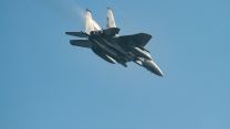 Sparks fly from an F-15 jet taking off from RAF Lakenheath (Picture: Ian Simpson).