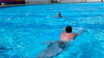 Swimming stage of the Royal Marines Rehabilitation Triathlon event 23062022 CREDIT BFBS.jpg