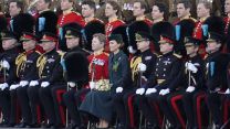 The Duke and Duchess of Cambridge sit for a group photo during their visit to 1st Battalion Irish Guards for the St Patrick's Day Parade, at Mons Barracks in Aldershot