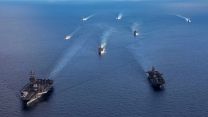 The Gerald R. Ford Carrier Strike Group and the Bataan Amphibious Ready Group, and Hellenic Navy frigate HS Navarinon sail in the Mediterranean Sea (Picture: US Dept of Defense).