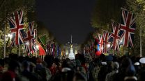 The Guards Division contingent of the Coronation procession rehearsing in London at night