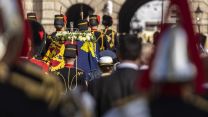 	The Procession crosses Horse Guards Parade. More than 320 members of Armed Forces personnel helped move The Queen’s coffin in procession from Buckingham Palace to Westminster Hall 