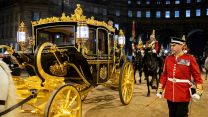 The Royal Carriage during the final full rehearsal, which took place at night, for the coronation of King Charles