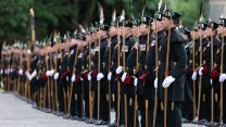 The Royal Company of Archers, (The King's Bodyguard for Scotland) part of The Tri-Service Guard of Honour (GoH) escorting the Crown Jewels procession