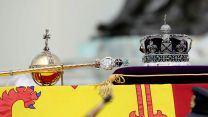 The State Crown, Orb and Sceptre were placed on top of Queen Elizabeth II's coffin during the funeral procession
