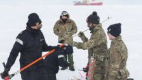 The team from HMS Protector surveys and researches the ice and oceans near the North Pole (Picture: Royal Navy).