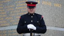 Tributes paid besides Liberation Monument in Stanley 14062022 CREDIT BFBS.JPG