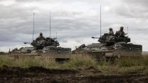 Two Warrior vehicles debrief after an attack Exercise IRON CYCLONE 28072023 CREDIT MOD.jpg