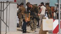 A US Marine plays with a child