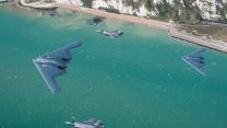 USAF B-2s fly over the English Channel with F-35Bs (Picture: MOD).