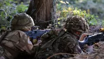 Ukrainian recruits taking part in shooting training in the UK