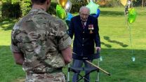 Veteran Captain Tom Moore finishes walk that raised millions for NHS charities.