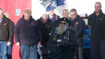 Veterans attend Remembrance service at Lady Haig Poppy Factory (Picture: BFBS)