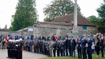 Veterans gather behind a detachment of Royal Marines outside Winchester Cathedral in Hampshire for the funeral of Major General Matthew Holmes