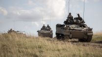 Warrior vehicles move in convoy across Salisbury Plain 25072023 CREDIT MOD.jpg