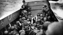 American soldiers in a landing barge sail across the Channel ahead of landing in Normandy (Picture: TopFotoP/PA).
