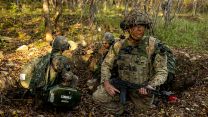 A soldier from C Company, the 1st Battalion Scots Guards checking their arcs alongside their Republic of Korean Army partners during the offensive phase during Exercise IMJIN WARRIOR (Picture: MOD).