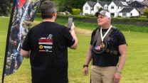 Sunbelt Rentals' Veterans Operations Manager Brett Kobell carried 22lb of weight around the course in support of veterans