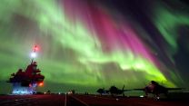 F-35B lightning jets on the flight deck of Prince of Wales under Aurora Borealis (Picture: MOD).