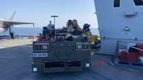 Firefighters on HMS Queen Elizabeth's flight deck.