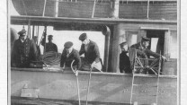 A 1912 English newspaper shows a diver going in to investigate the wreck of the A3 - (c) Daily Graphic