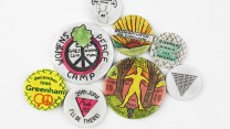 Protester Anna Johnson's badges are on display.