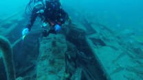 Diver looking at the engine of the 'Arfon' - 
Copyright Swanage Boat Charters Ltd