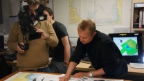 National Museum of the Royal Navy historian Nick Hewitt explaining the scans to an onboard BBC documentary team.