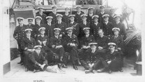 The officers of HMS Falmouth - including Rear Admiral Trevylyan Napier, Captain John Douglas Edwards and the mascot "Kaiser Bill" - Image courtesy of John McDonald