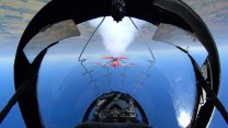 Pic Two

Red 10 & 11 of the RAF Aerobatic Team, The Red Arrows, practicing their manoeuvres over RAF Scampton, Lincoln. This picture shows the pilots view.

Photo Crown Copyright 2006