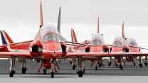 This image was submitted as part of the RAF Photographers Photographic Competition 2005.

Red Arrows preparing to take off from RAF Marham.

Photo Crown Copyright 2005