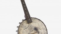 A banjo signed by the US 4th Fighter group, formed from three RAF Eagle Squadrons of volunteer American pilots.