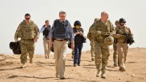 Phillip Hammond MP, Secretary of State for Defence, walks the short distance from PB Sterga 2 helipad to the base itself