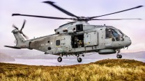 Pictured are 820 Naval Air Squadron making the most of the Cornish Landscape to hone their Fly Navy skills.  A local photographer, Greg Caygill, caught the Merlin Mk2 helicopter in the sand dunes near Perranporth beach. 