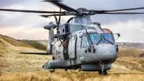 Pictured are 820 Naval Air Squadron making the most of the Cornish Landscape to hone their Fly Navy skills.  A local photographer, Greg Caygill, caught the Merlin Mk2 helicopter in the sand dunes near Perranporth beach. 