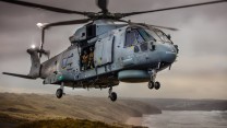 Pictured are 820 Naval Air Squadron making the most of the Cornish Landscape to hone their Fly Navy skills.  A local photographer, Greg Caygill, caught the Merlin Mk2 helicopter in the sand dunes near Perranporth beach. 