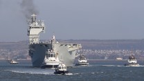 HMS Ocean arrives for the last time
