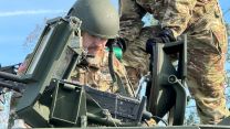 Jay Tenison climbing into the Abrams Main Battle Tank that he wished to fire for the last time (Picture: Courtesy Picture).