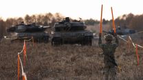 soldier from 32 Engineer Regiment marshals four Polish tanks across a cleared ‘minefield’ 23022024 CREDIT MOD