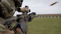 An empty case is ejected as a marine opens fire with the KS-1