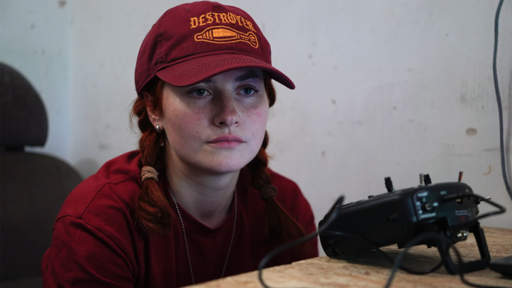 Mavka studies the screen of a UGV (unmanned ground vehicle) in a control centre not far from the frontline 