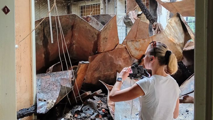 BFBS Forces News reporter Hannah King photographs the aftermath of a twin Russian strike in Kharkiv which claimed several lives (Picture: BFBS)