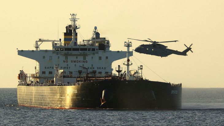 The initial boarding party fast-roped onto the crude oil tanker Smyrtos from two Chonooks, with police officers from the National Crime Agency being dropped off by this Merlin (Picture: MOD)