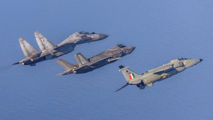 At the end of mock hostilities, a British F-35B is flanked by an Su-30MKI and a Jaguar