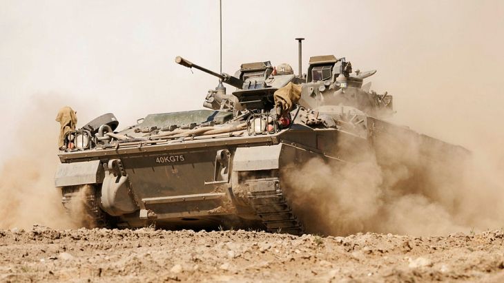 While this Warrior goes on exercise out in Poland, something has to give back home - the question is what will the Treasury take to make up the £400m? (Picture: MOD)