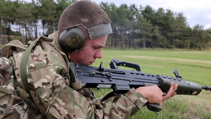A cadet carries out his Normal Safety Precautions drills on his L98A2 Cadet GP rifle, looking inside to check the chamber, the body of the rifle and the face of the bolt are clear (Picture: BFBS)