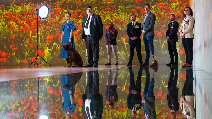 Veterans and their families whose lives have been reconstructed with the aid of the RBL gathered at Frameless (Picture: PA)