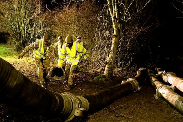 British Army assist the Environment Agency with floods.
